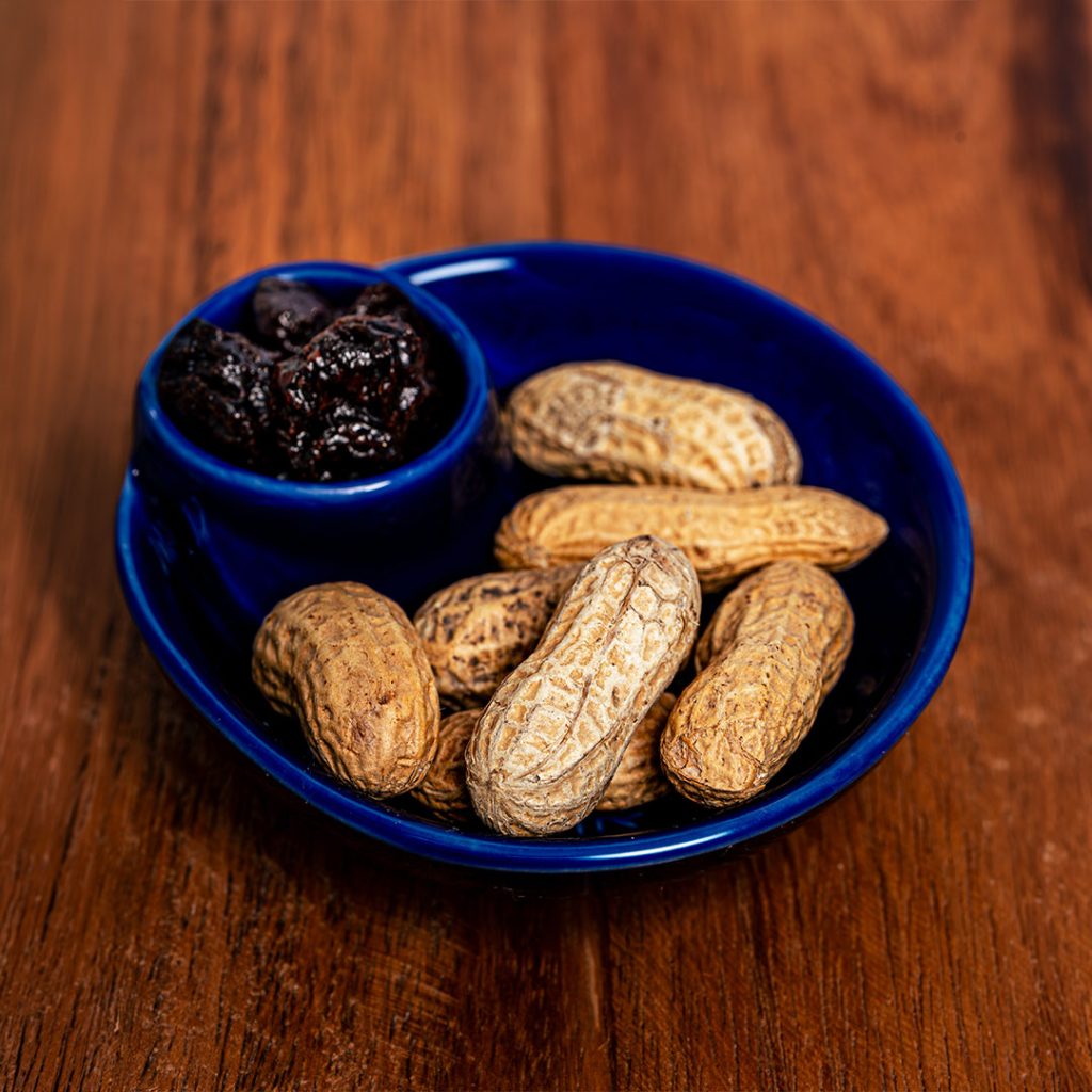 Peanuts and dried fruit in bowl